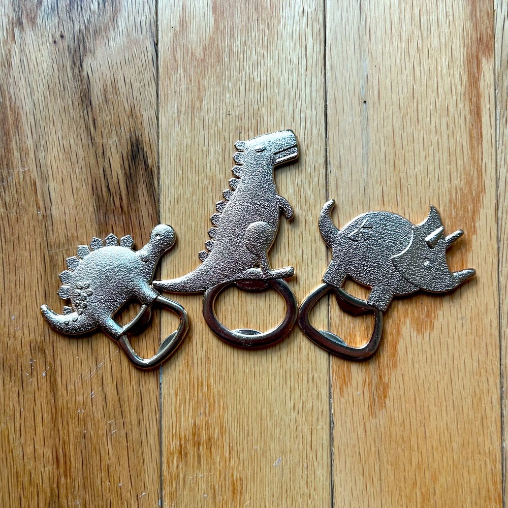 Three Dinosaur Gold Bottle Openers